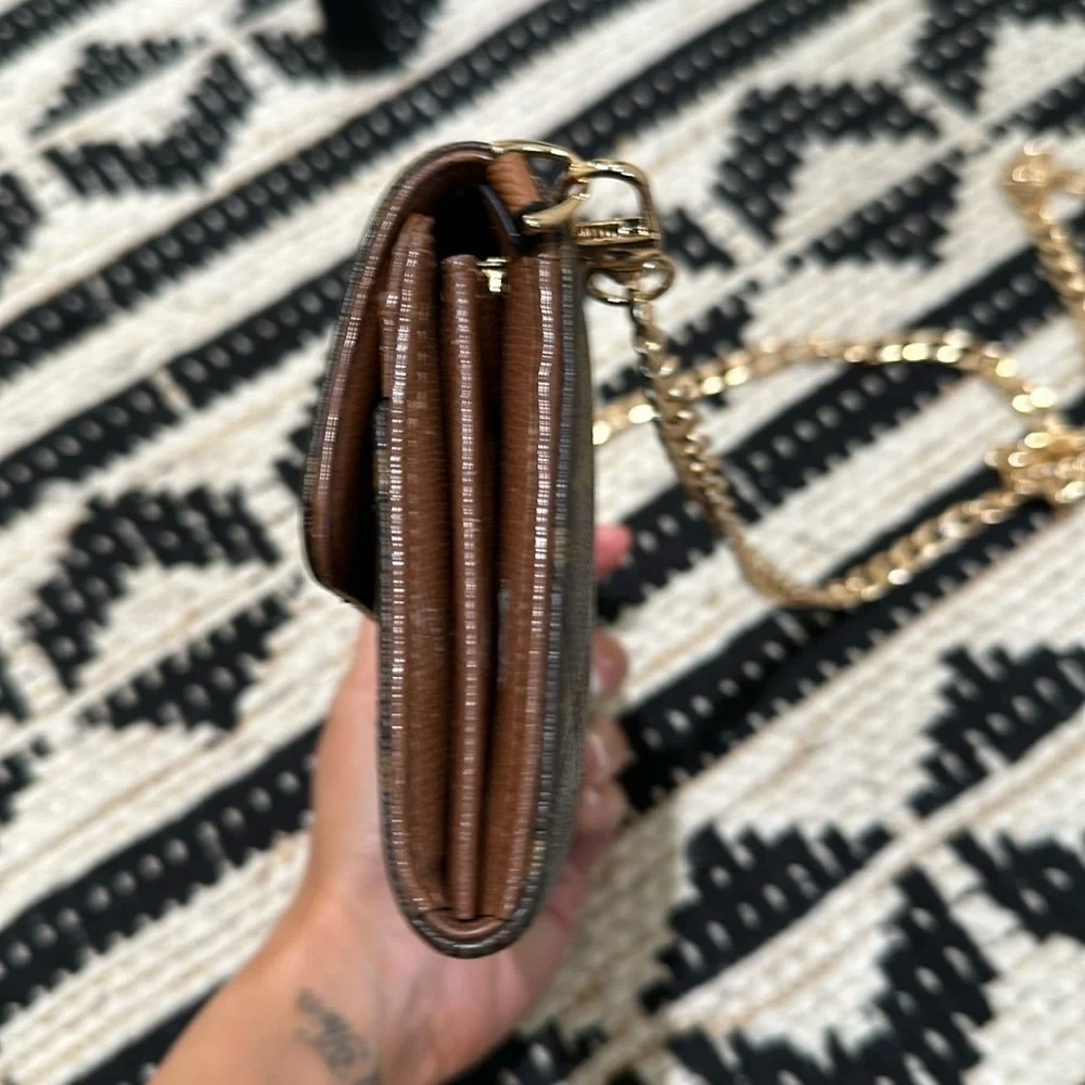 Collectible louis vuitton etoile sarah wallet .